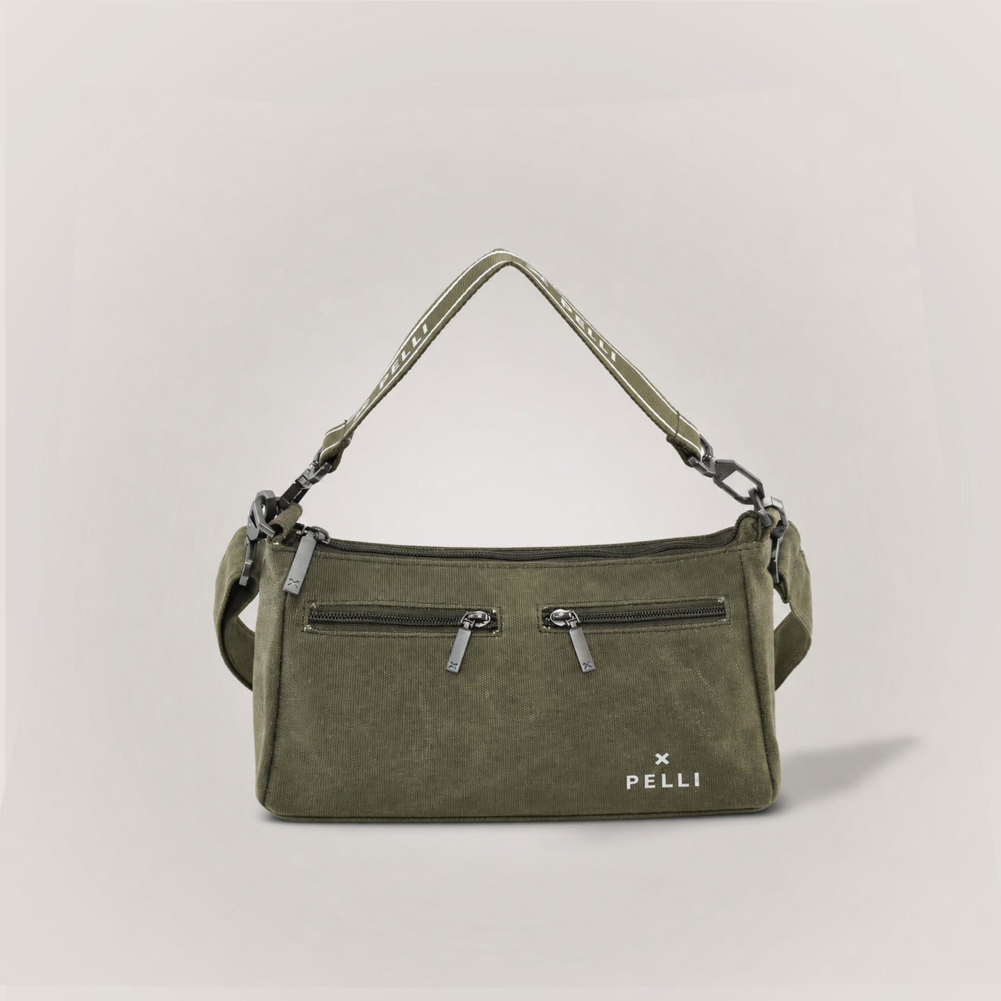 The Wanderer waxed canvas crossbody bag in Burnt Olive - front view