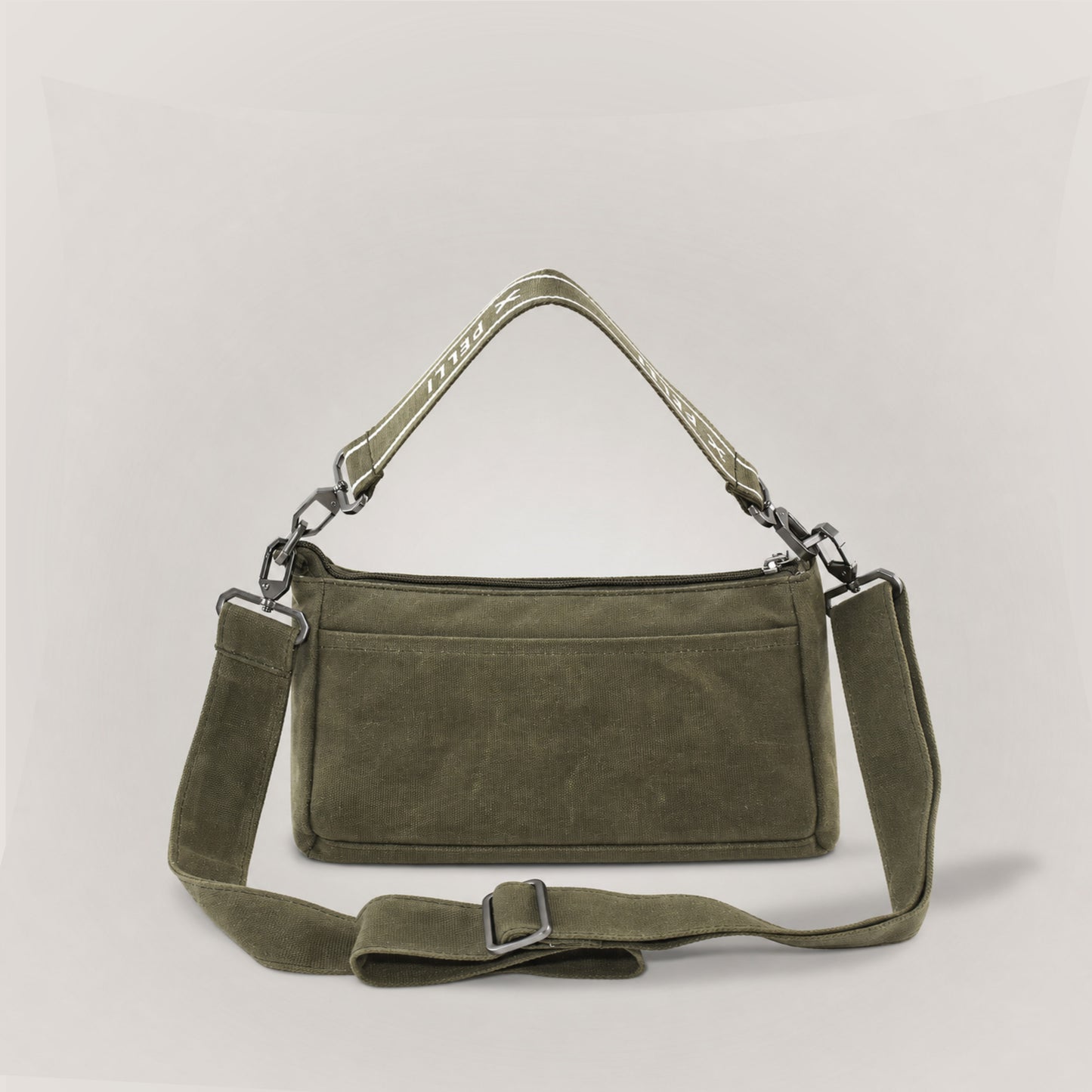 The Wanderer waxed canvas crossbody bag in Burnt Olive - back view