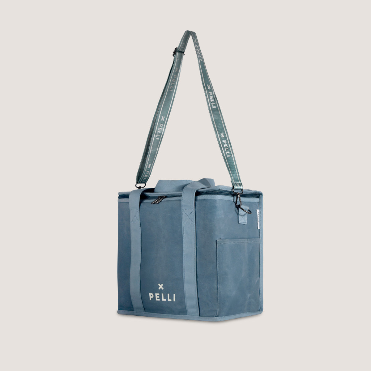 Load image into Gallery viewer, OK Chill Crossbody - Waxed Canvas Medium Cooler Bag with Shoulder Strap in Dusty Blue
